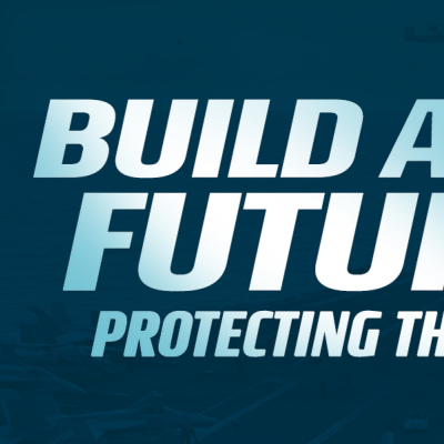  NAVAIR businessman smiling with crossed arms, ‘Build A Future Protecting The Nation'